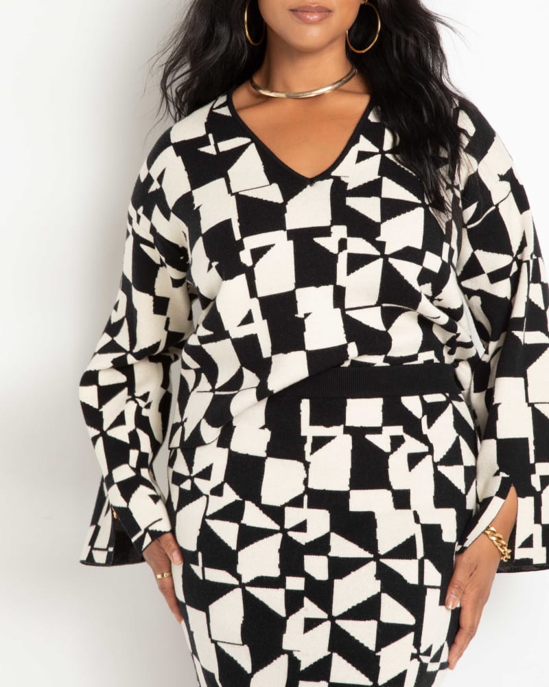 Front of a model wearing a size 14/16 Intarsia Sweater in All There by ELOQUII. | dia_product_style_image_id:236767